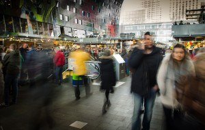 A blurred image of people shopping in New York City